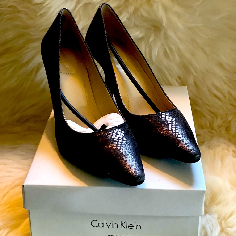 NIB! Calvin Klein “Dolly” Pumps. Brand new in box. Size 8M Snakeskin Metallic